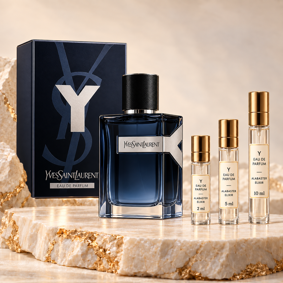 Yves Saint Laurent Y Eau de Parfum bottle, retail box and Alabaster Elixir decant sprays in 2 ml, 5 ml and 10 ml sizes.